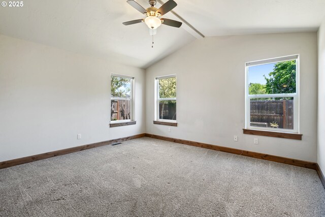 empty room with baseboards, carpet floors, and a ceiling fan