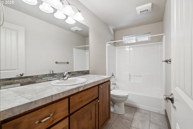 full bath featuring toilet, vanity,  shower combination, and tile patterned flooring