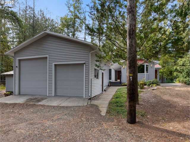 rear view of house with a gazebo and a deck