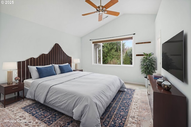 bedroom featuring vaulted ceiling and ceiling fan