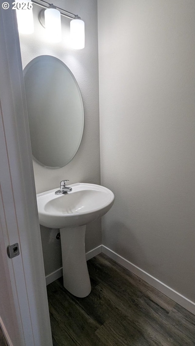 1745 NE 8th St, Hermiston, OR 97838 - bathroom with baseboards and wood finished floors