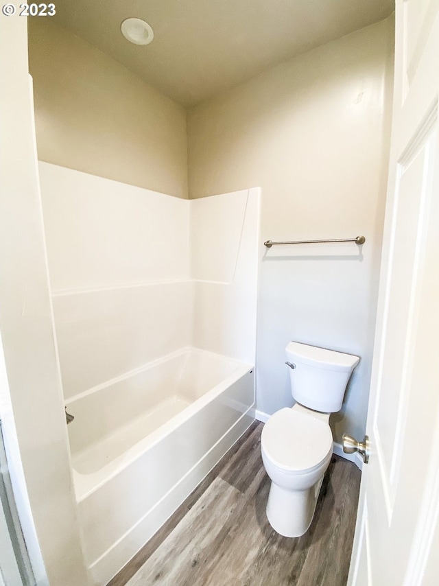 585 Baker St, Baker City, OR 97814 - bathroom with wood finished floors and shower / tub combination