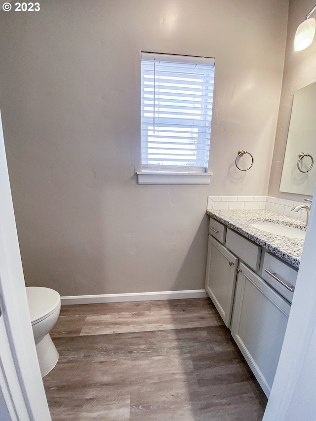 585 Baker St, Baker City, OR 97814 - bathroom featuring vanity and wood finished floors