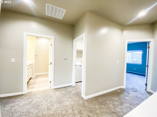 585 Baker St, Baker City, OR 97814 - hall featuring carpet flooring and washer / clothes dryer