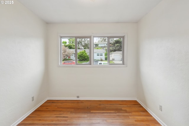 1831 E 14th St, The Dalles, OR 97058 - empty room featuring light wood-style floors and baseboards