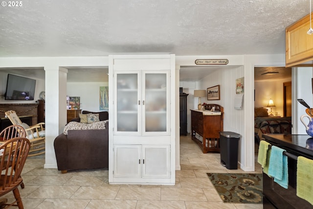 1831 E 14th St, The Dalles, OR 97058 - living area with a textured ceiling and light tile patterned floors