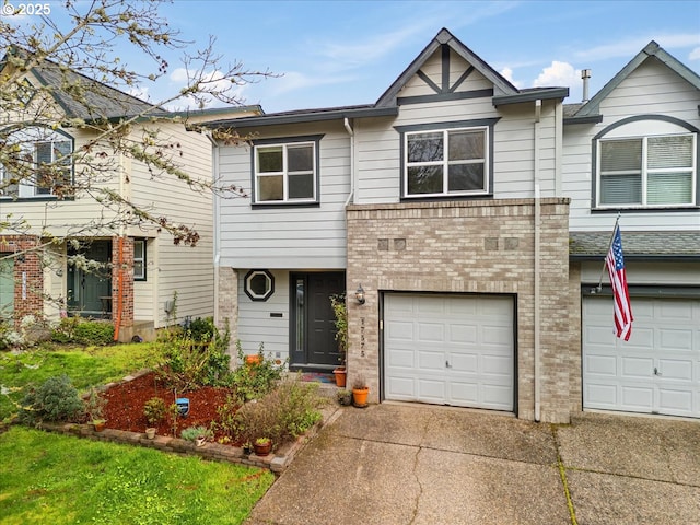 17575 SW Heatherwood Ln, Sherwood, OR 97140 - townhome / multi-family property with brick siding, an attached garage, and concrete driveway