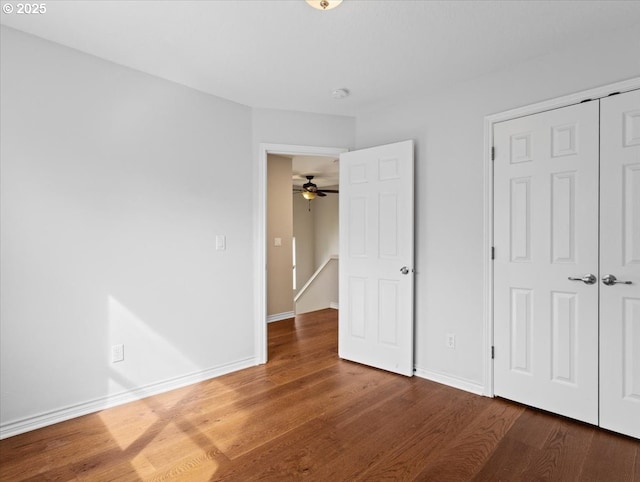 17575 SW Heatherwood Ln, Sherwood, OR 97140 - unfurnished bedroom featuring a closet, baseboards, and wood finished floors