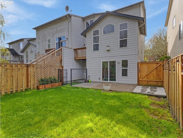 17575 SW Heatherwood Ln, Sherwood, OR 97140 - back of house featuring a yard, a fenced backyard, a gate, and a patio area