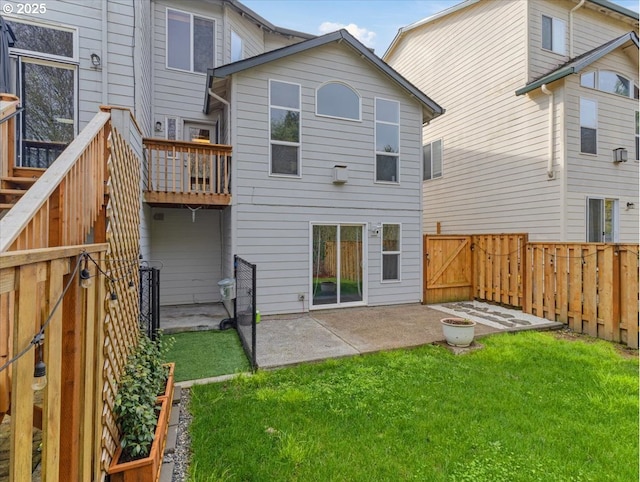 17575 SW Heatherwood Ln, Sherwood, OR 97140 - back of property featuring a patio, a fenced backyard, and a lawn