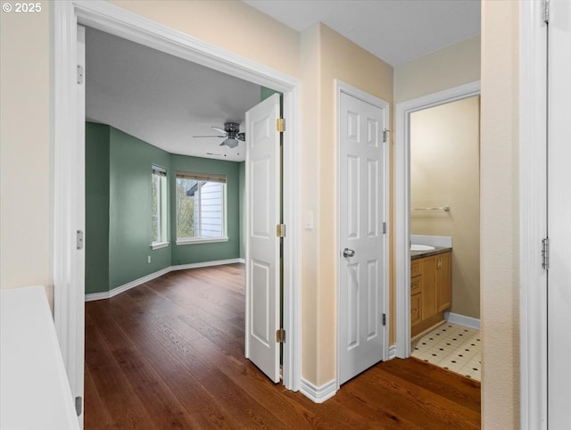 17575 SW Heatherwood Ln, Sherwood, OR 97140 - corridor featuring wood finished floors and baseboards