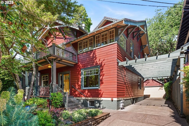 1816 NE 14th Ave, Portland, OR 97212 - view of front facade featuring a balcony and an outdoor structure