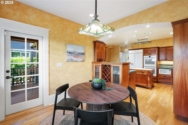 1816 NE 14th Ave, Portland, OR 97212 - dining area with light wood-type flooring, recessed lighting, and a textured wall