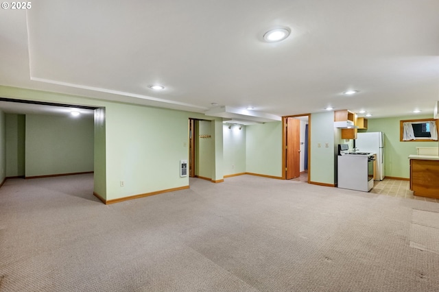 1816 NE 14th Ave, Portland, OR 97212 - finished basement featuring baseboards, light colored carpet, recessed lighting, and freestanding refrigerator