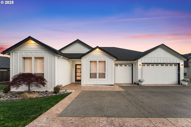 10809 NE 102nd Ave, Vancouver, WA 98662 - view of front of house with an attached garage, board and batten siding, concrete driveway, and roof with shingles