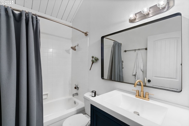 bathroom with vanity, toilet, and shower / tub combo