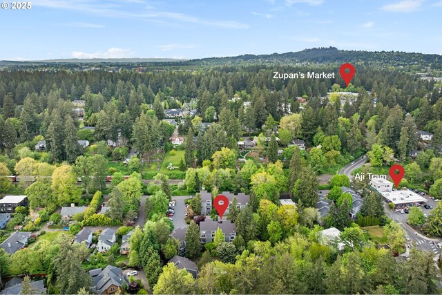bird's eye view with a view of trees