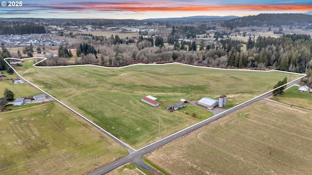 aerial view at dusk with a rural view