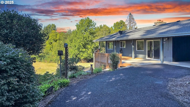 view of side of property featuring a patio