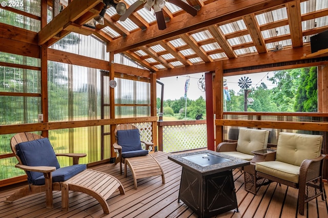 241 Growlers Gulch Rd, Castle Rock, WA 98611 - sunroom / solarium featuring a fire pit and ceiling fan