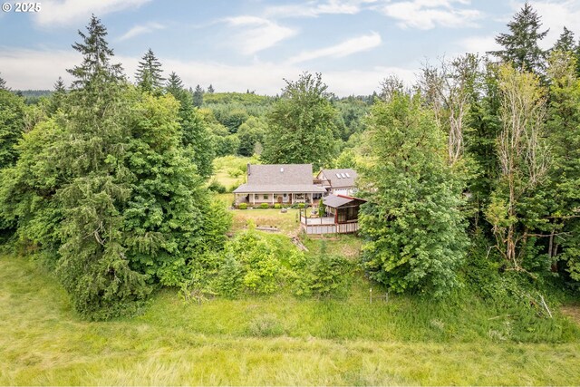 241 Growlers Gulch Rd, Castle Rock, WA 98611 - aerial view of property and surrounding area with a heavily wooded area