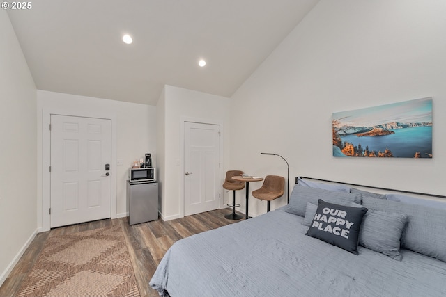 119/121 Tioga Ln, Idleyld Park, OR 97447 - bedroom with fridge, wood finished floors, baseboards, recessed lighting, and high vaulted ceiling