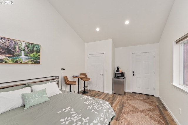 119/121 Tioga Ln, Idleyld Park, OR 97447 - bedroom with vaulted ceiling, wood finished floors, baseboards, and recessed lighting