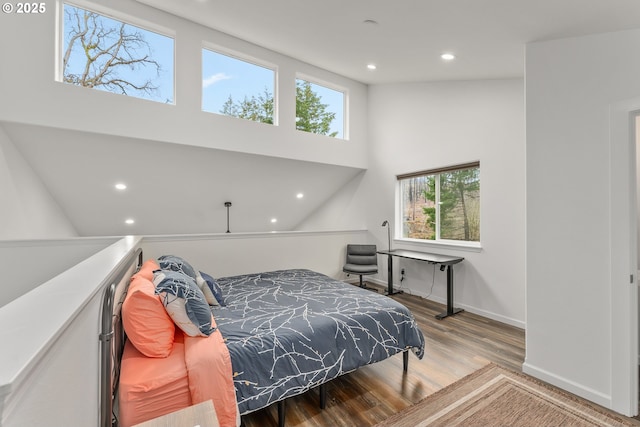 119/121 Tioga Ln, Idleyld Park, OR 97447 - bedroom with wood finished floors, recessed lighting, baseboards, and a towering ceiling