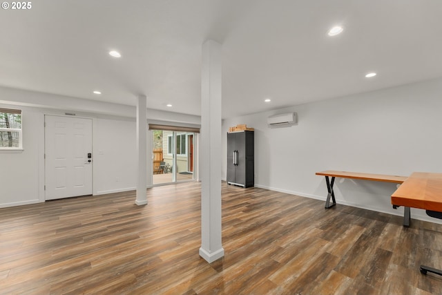 119/121 Tioga Ln, Idleyld Park, OR 97447 - foyer entrance featuring an AC wall unit, wood finished floors, healthy amount of natural light, and recessed lighting
