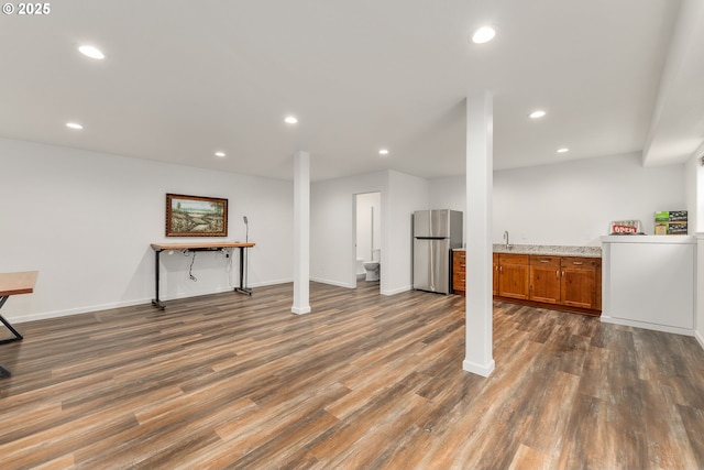 119/121 Tioga Ln, Idleyld Park, OR 97447 - finished basement with freestanding refrigerator, recessed lighting, dark wood finished floors, a sink, and baseboards