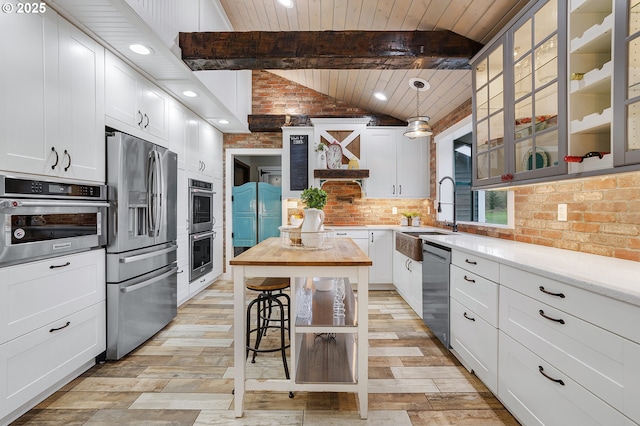 19434 S Logan Dr, Beavercreek, OR 97004 - kitchen featuring appliances with stainless steel finishes, wood ceiling, light wood-type flooring, white cabinets, and recessed lighting