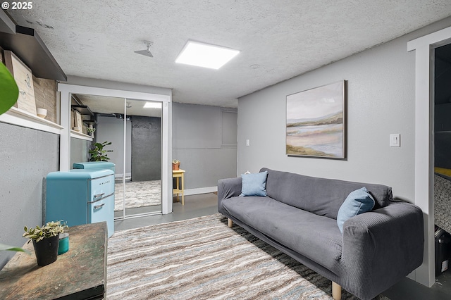 19434 S Logan Dr, Beavercreek, OR 97004 - living room with finished concrete flooring and a textured ceiling