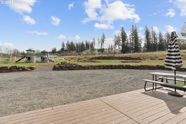 19434 S Logan Dr, Beavercreek, OR 97004 - dock area featuring a playground and a deck
