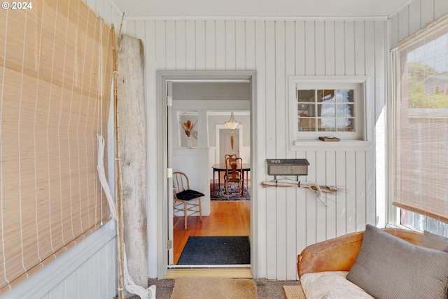 hall featuring wood finished floors