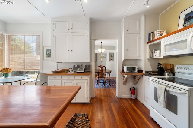kitchen with white appliances, butcher block counters, dark wood-type flooring, and white cabinets