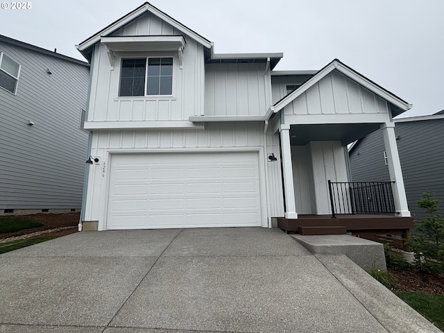 6286 SE 20th St, Gresham, OR 97080 - view of front of house with board and batten siding, concrete driveway, a garage, and a porch