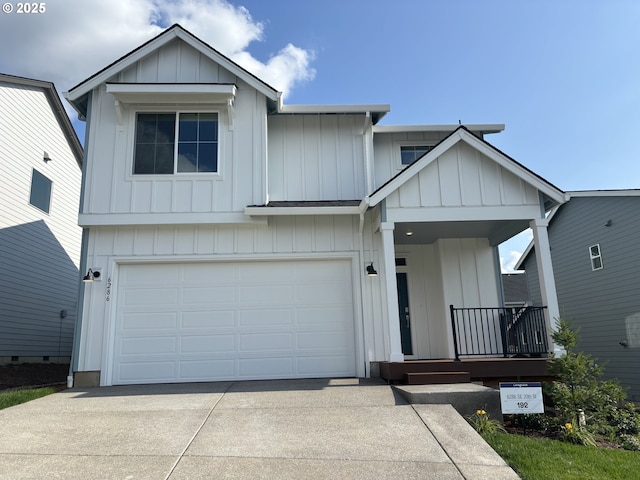 6286 SE 20th St, Gresham, OR 97080 - view of front facade with concrete driveway, an attached garage, board and batten siding, and a porch