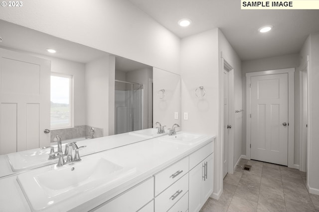 6286 SE 20th St, Gresham, OR 97080 - full bathroom featuring double vanity, recessed lighting, a garden tub, a shower, and baseboards