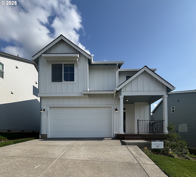 6286 SE 20th St, Gresham, OR 97080 - view of front of home featuring board and batten siding, concrete driveway, a garage, and covered porch