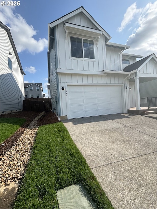 6286 SE 20th St, Gresham, OR 97080 - view of front of property featuring board and batten siding, driveway, and a garage