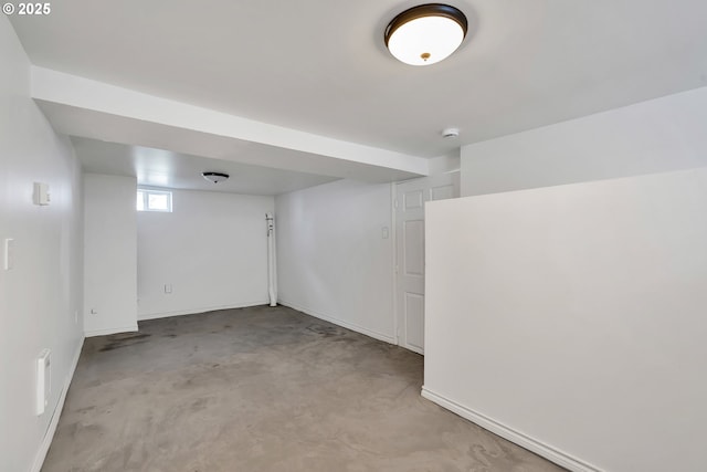 basement featuring baseboards
