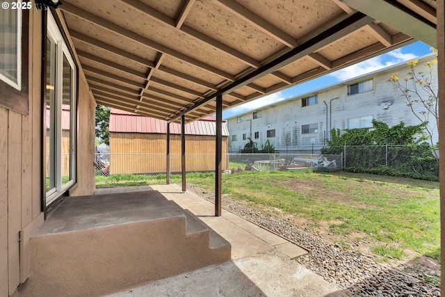 view of patio / terrace featuring fence