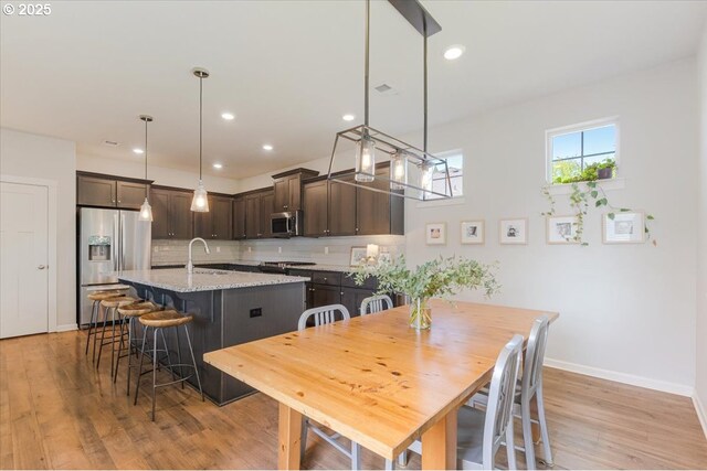 7010 SW Barr Ln, Tualatin, OR 97062 - dining room with light wood-style floors and recessed lighting