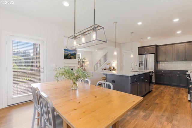 7010 SW Barr Ln, Tualatin, OR 97062 - dining room with wood-type flooring and recessed lighting