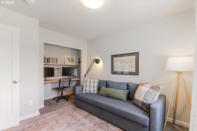 7010 SW Barr Ln, Tualatin, OR 97062 - carpeted living room featuring baseboards and built in desk
