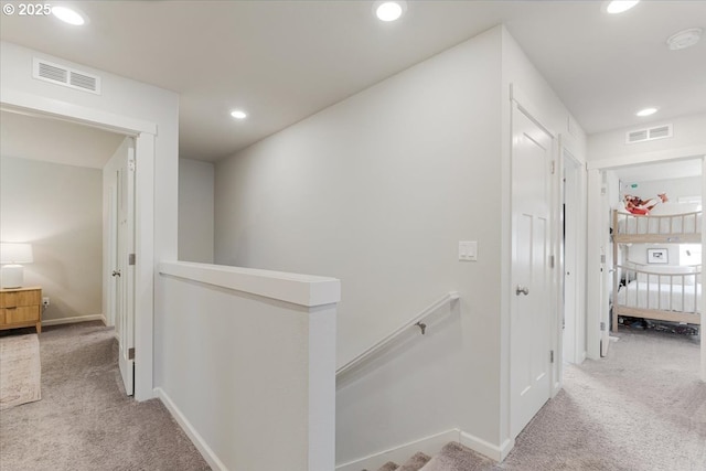 7010 SW Barr Ln, Tualatin, OR 97062 - hall with carpet, an upstairs landing, and recessed lighting