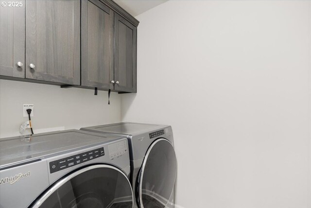 7010 SW Barr Ln, Tualatin, OR 97062 - laundry room with cabinet space and washing machine and dryer