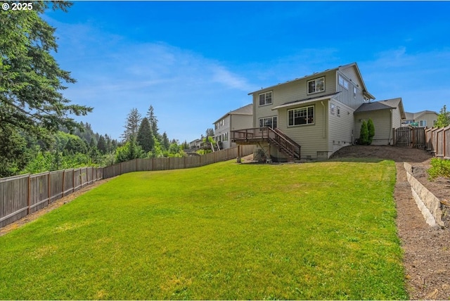 7010 SW Barr Ln, Tualatin, OR 97062 - fenced backyard with stairway and a deck