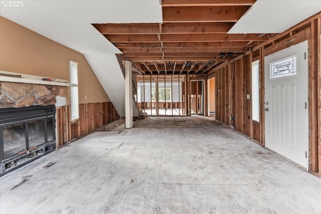 unfurnished living room featuring a fireplace