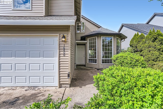 property entrance featuring a garage